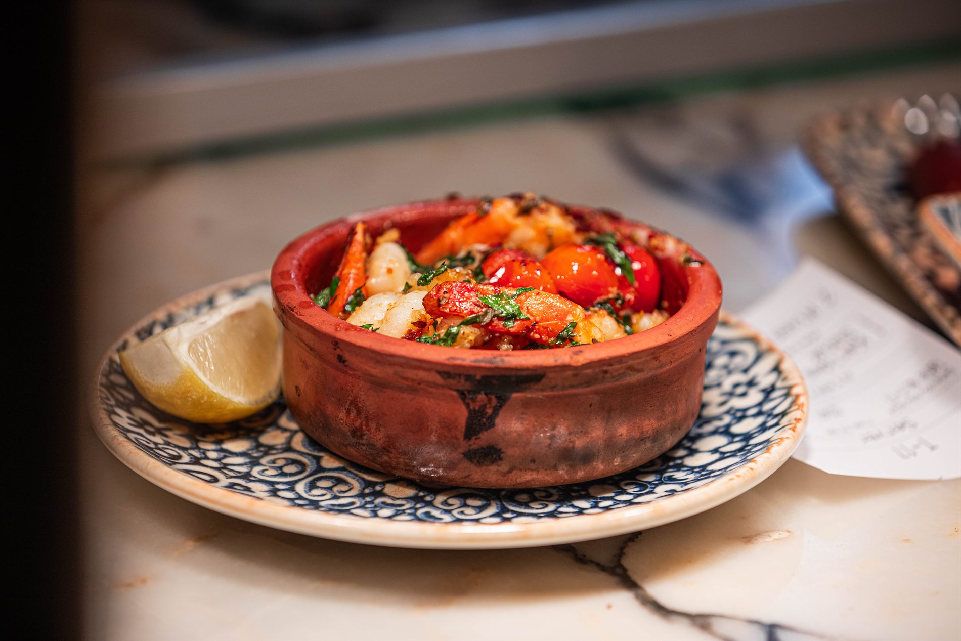 Güveç served in an earthenware pot