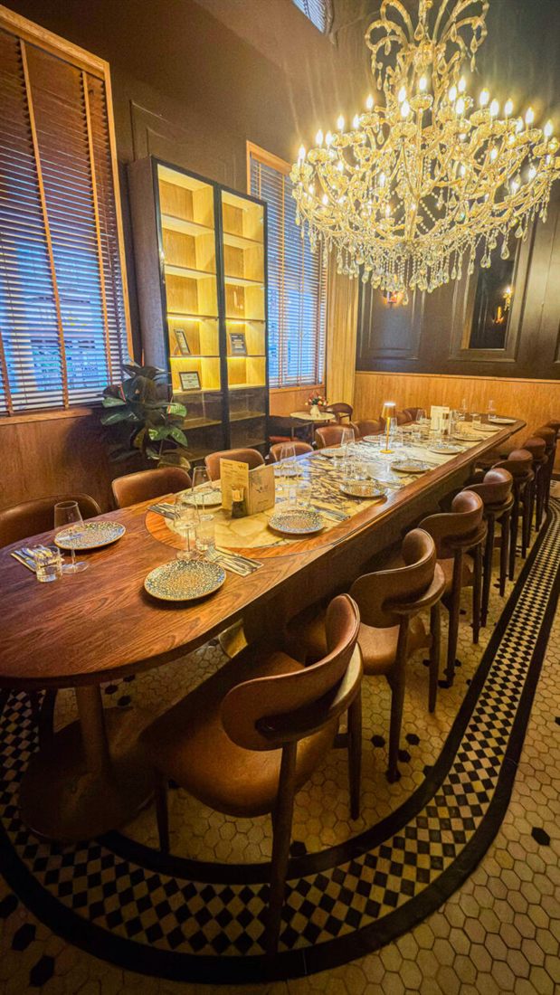 A long table set for a group at Elif